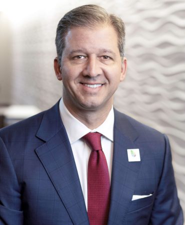 Photo of man smiling at camera