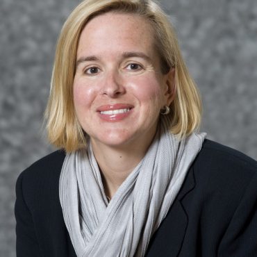 Photo of woman smiling at camera