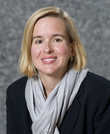Photo of woman smiling at camera
