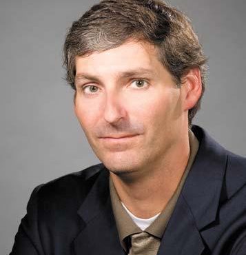 Photo of man smiling at camera