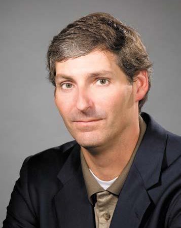 Photo of man smiling at camera