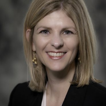 Photo of woman smiling at camera