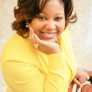 Photo of woman smiling at camera