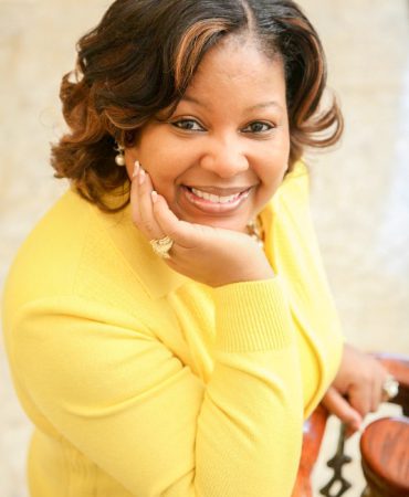 Photo of woman smiling at camera