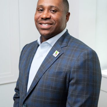 Photo of man smiling at camera