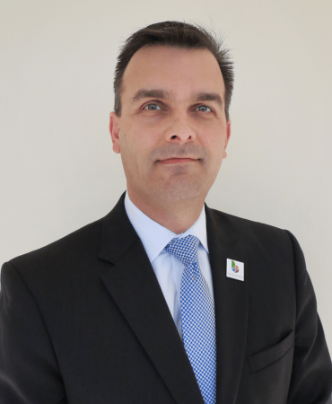 Photo of man smiling at camera