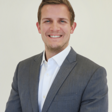 Photo of man smiling at camera