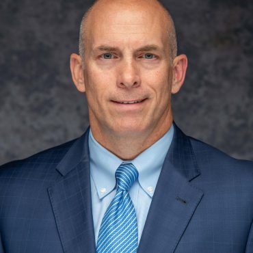 Photo of man smiling at camera