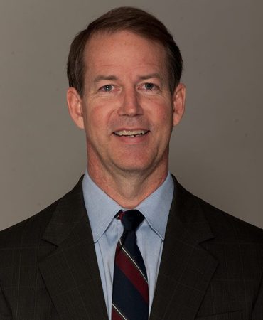 Photo of man smiling at camera