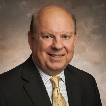 Photo of man smiling at camera