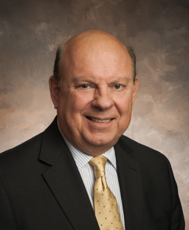 Photo of man smiling at camera