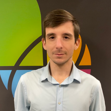 Photo of man smiling at camera