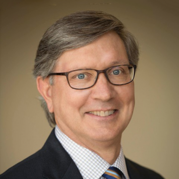 Photo of man smiling at camera