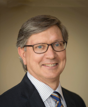 Photo of man smiling at camera