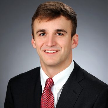Photo of man smiling at camera