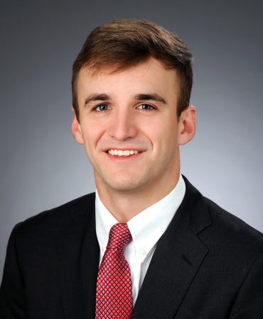 Photo of man smiling at camera