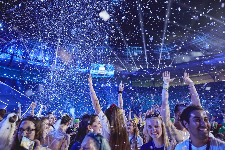 35852651913_17cdc40ab5_o Photo of people smiling with confetti in the air
