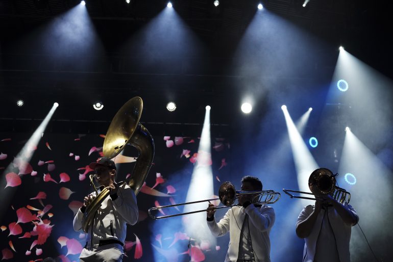Photo of brass band playing on stage