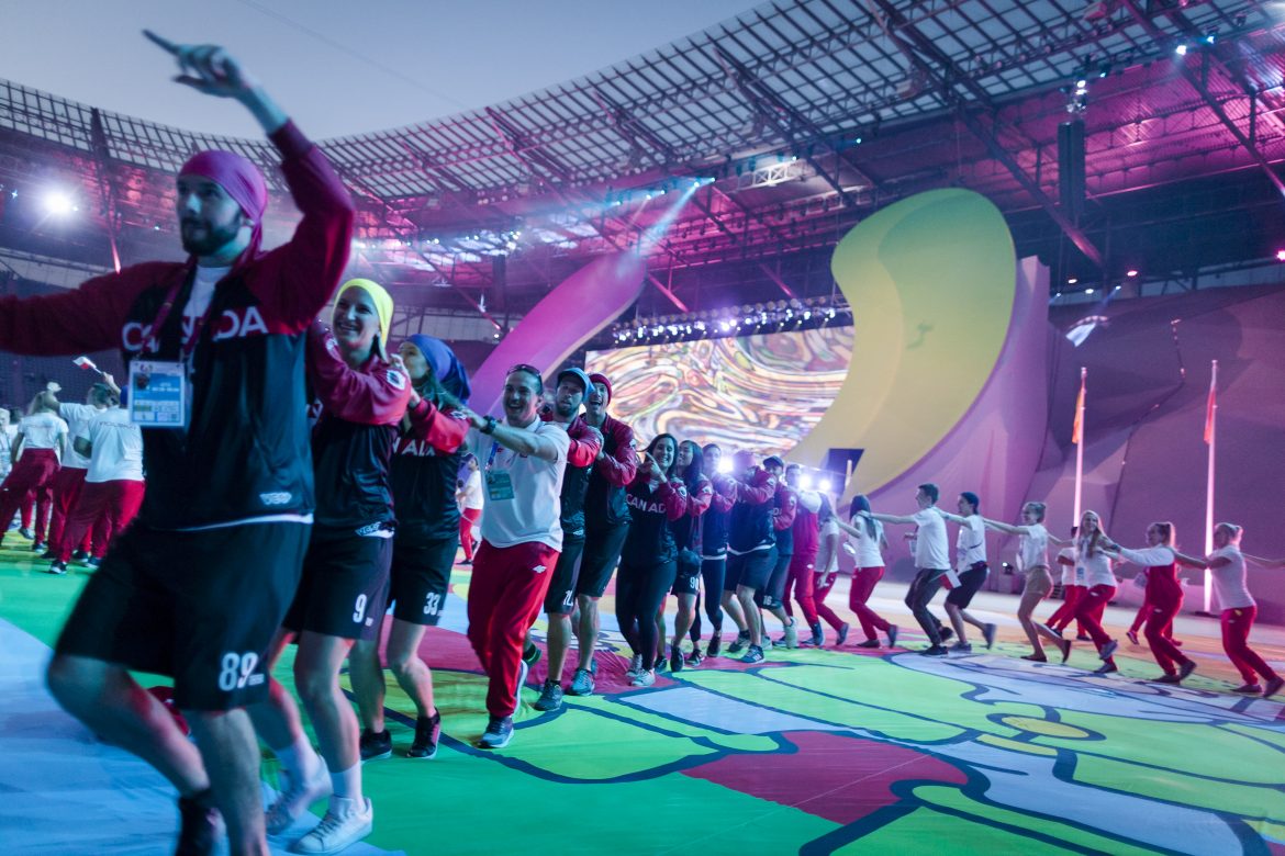 36492494652_8f8475e5a9_o Photo of Canadian athletes in a conga line