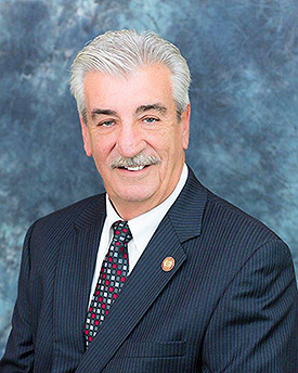Photo of man smiling at camera