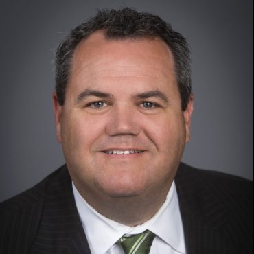 Photo of man smiling at camera