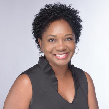 Photo of woman smiling at camera