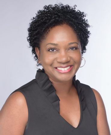Photo of woman smiling at camera