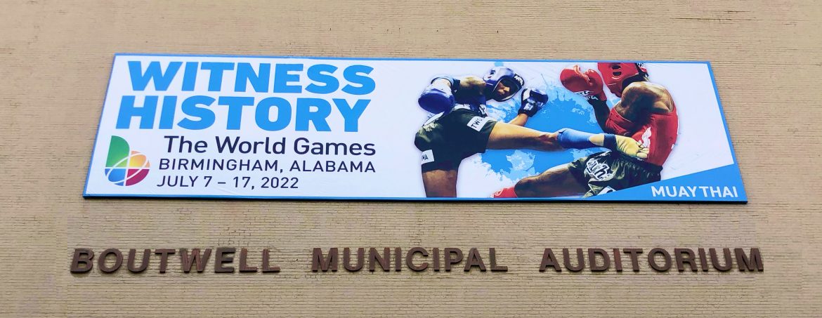 Photo of Boutwell Auditorium exterior with World Games banner for Muay Thai