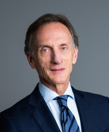 Photo of man smiling at camera