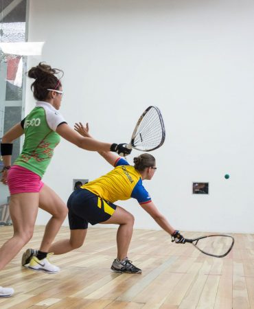 Photo of women playing racquet ball