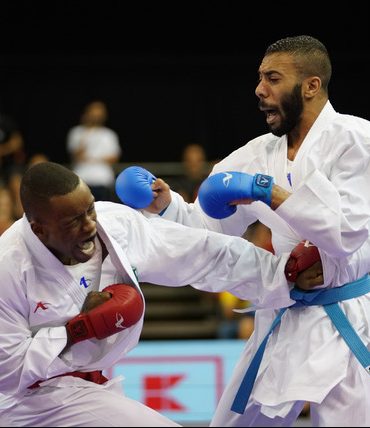Photo of men sparing in karate