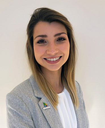 Photo of woman smiling at camera