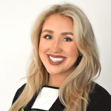 Photo of woman smiling at camera