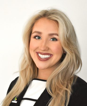 Photo of woman smiling at camera