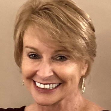 Photo of woman smiling at camera