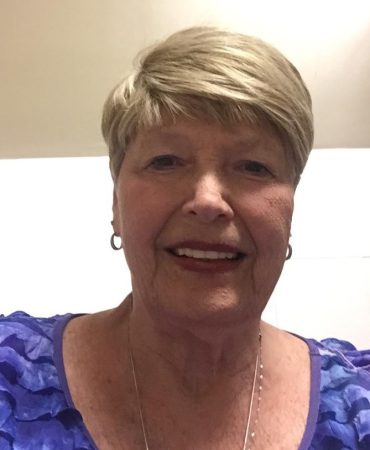 Photo of woman smiling at camera