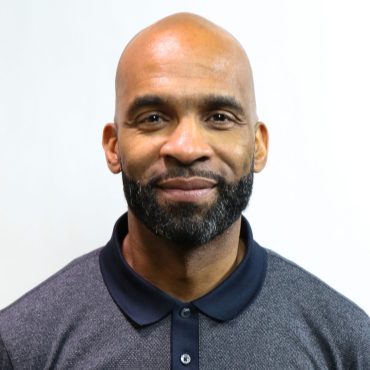 Photo of man smiling at camera