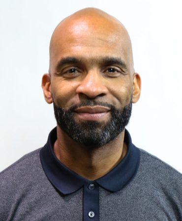 Photo of man smiling at camera