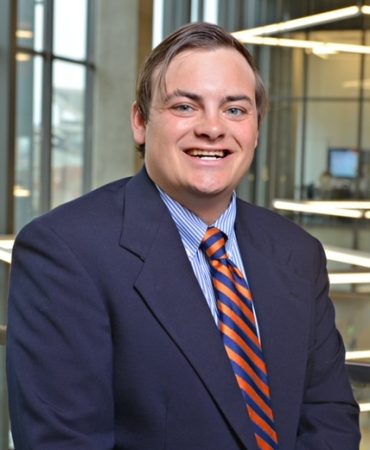 Photo of man smiling at camera